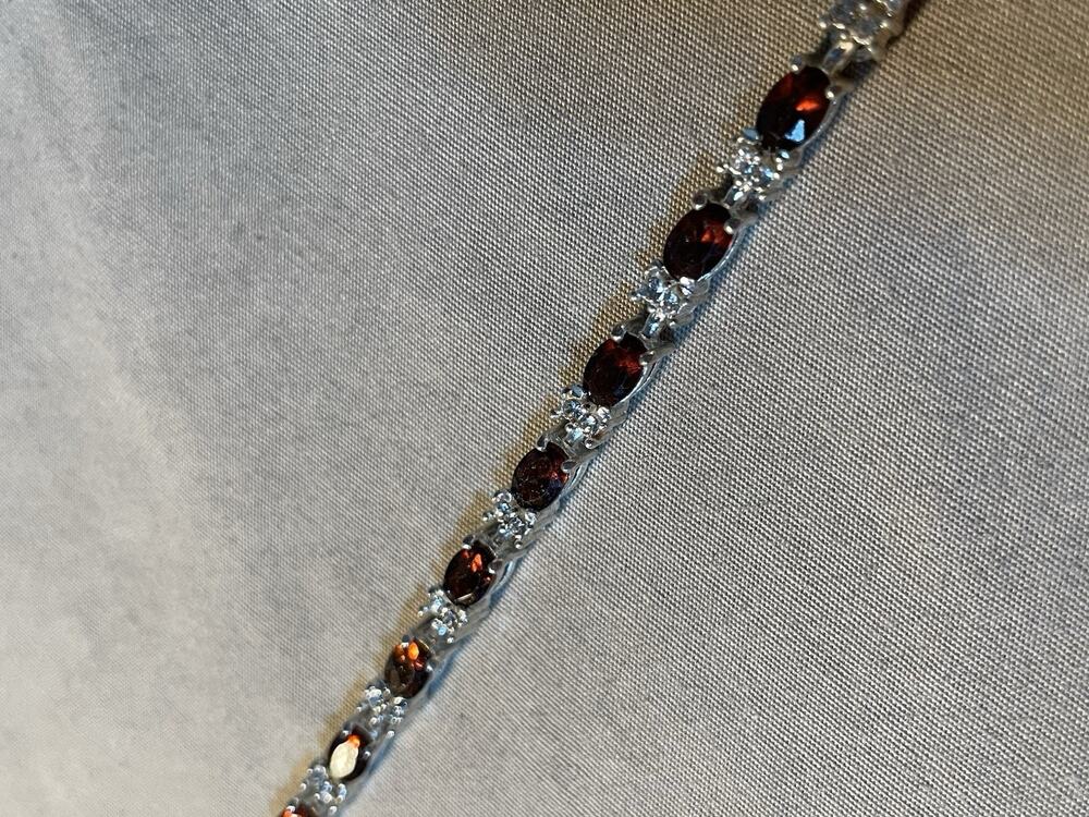 Avon 7.5 Inches Red Ruby Colored Rhinestone Tennis Bracelet